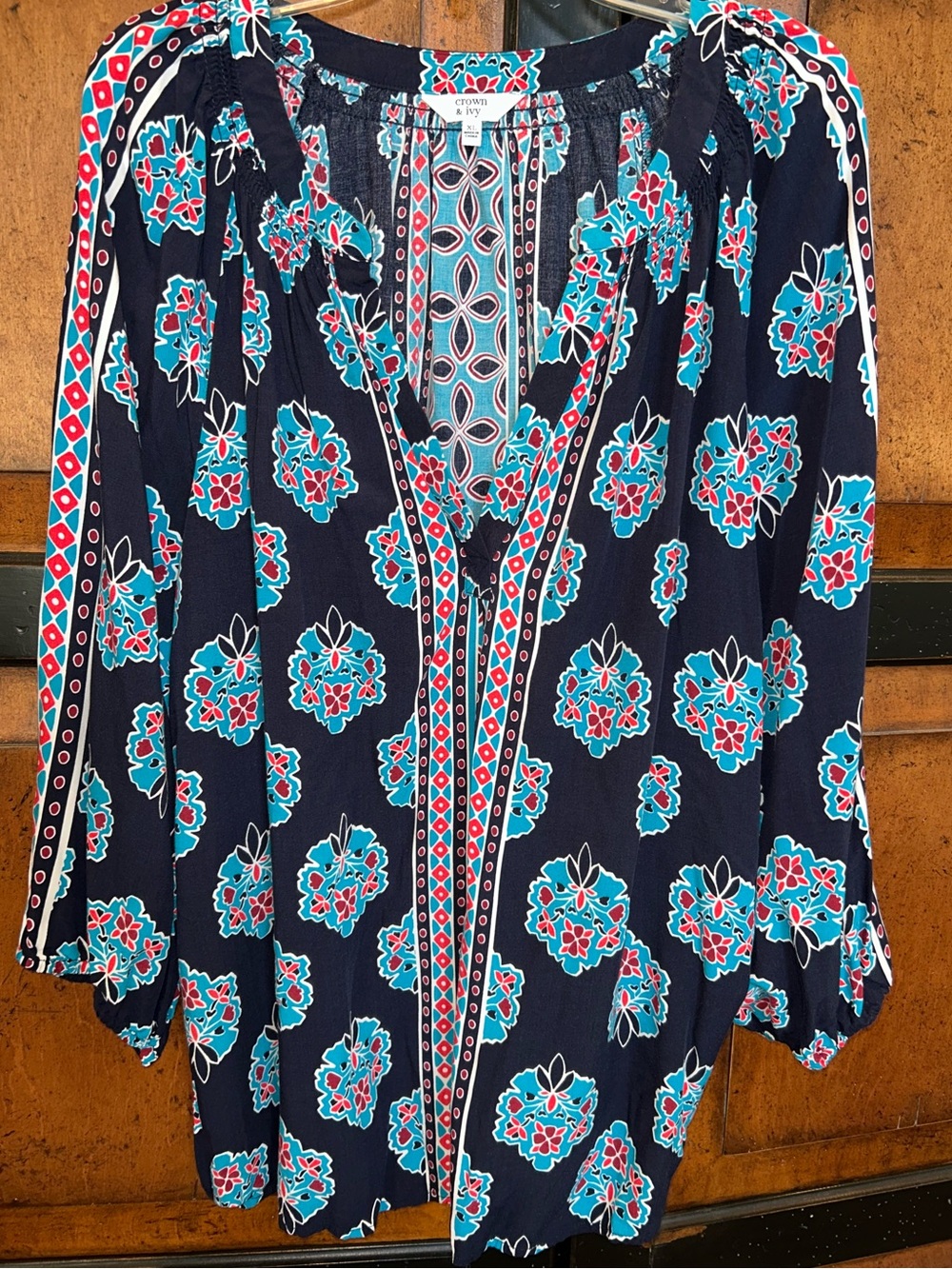 crown & ivy Navy Floral Peasant Tunic with Teal and Red Accents